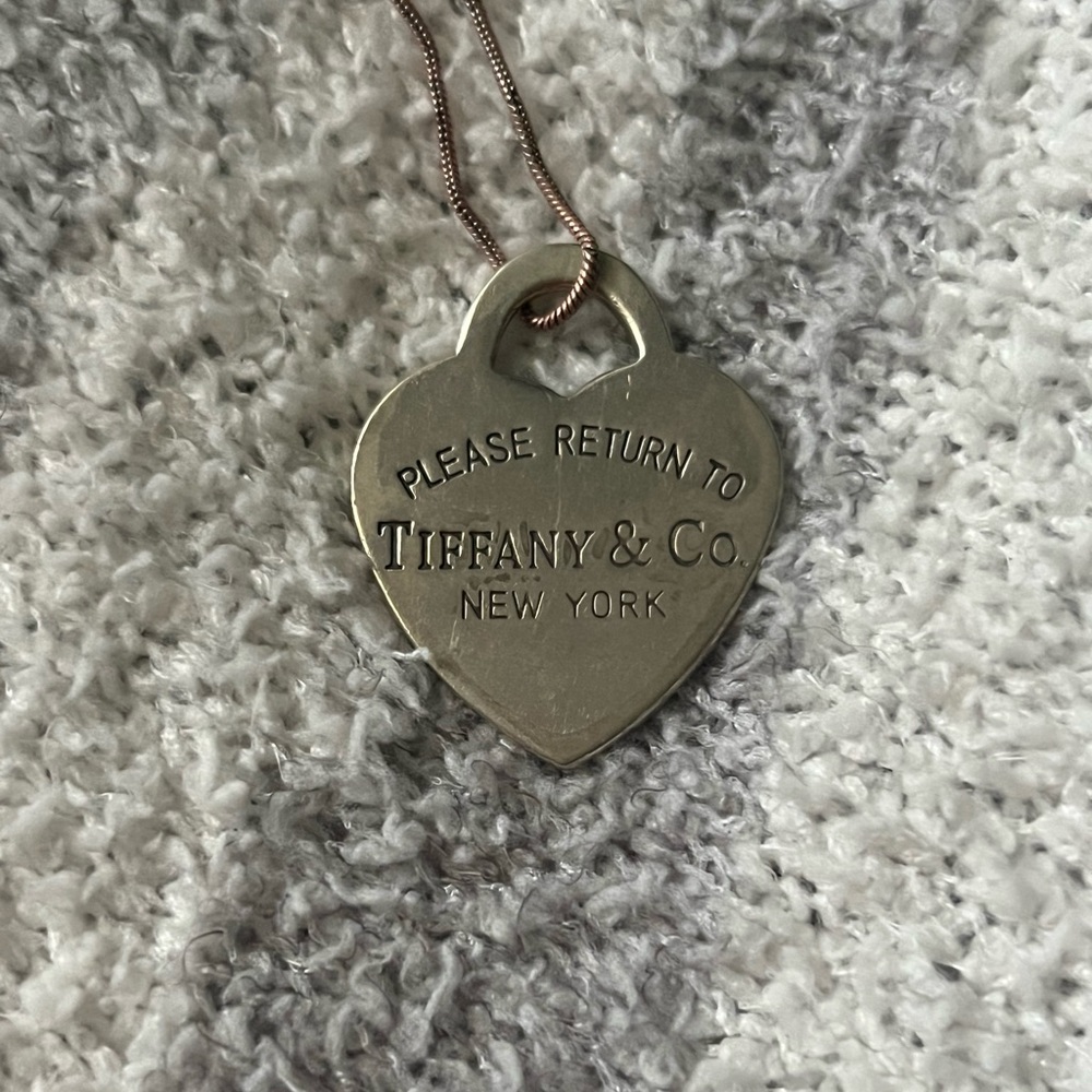 Vintage Tiffany and Co pendant cord it’s on isn’t Tiffany. 1.5 by 1.5